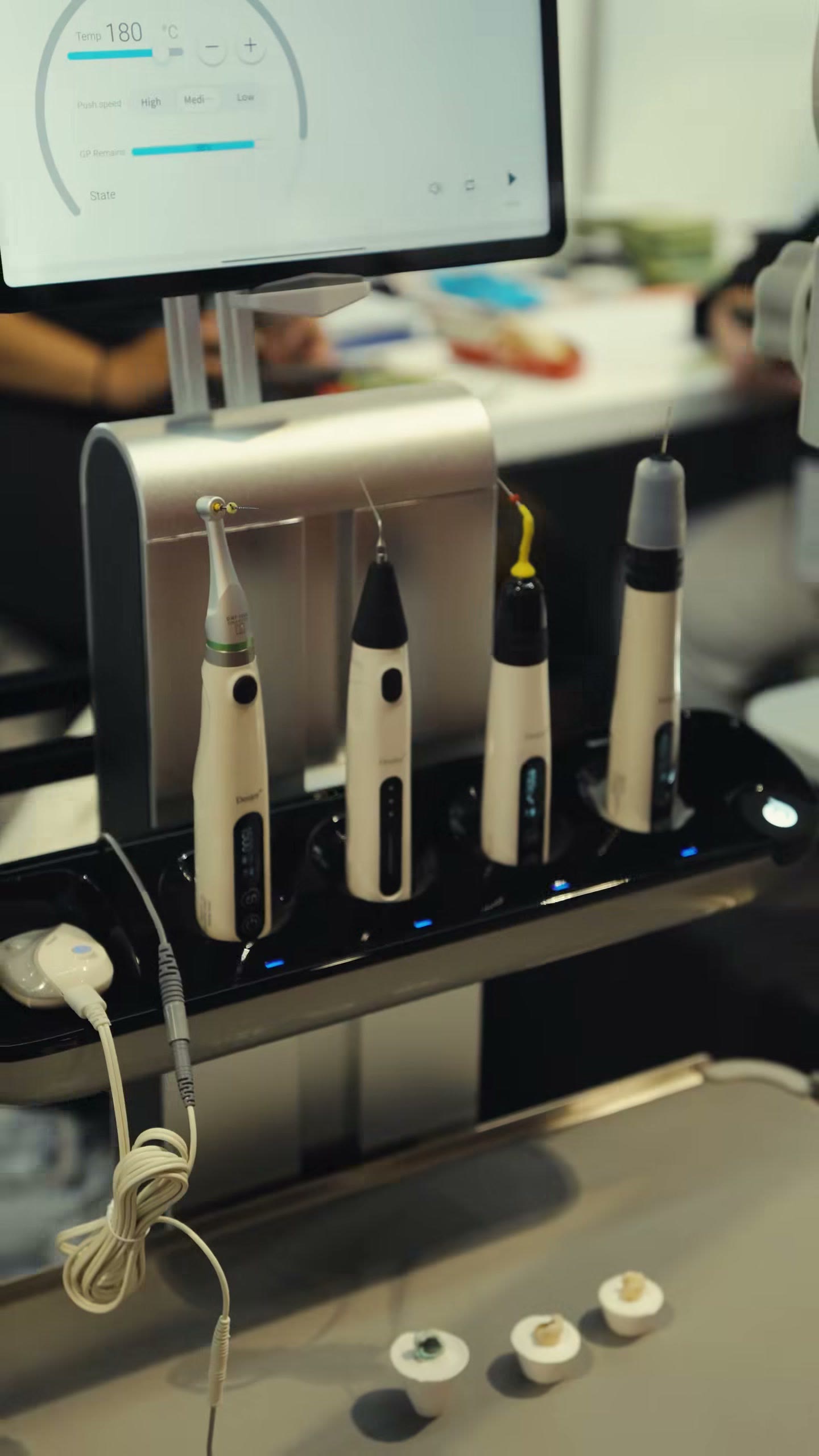 Endo motors resting on their charging stand