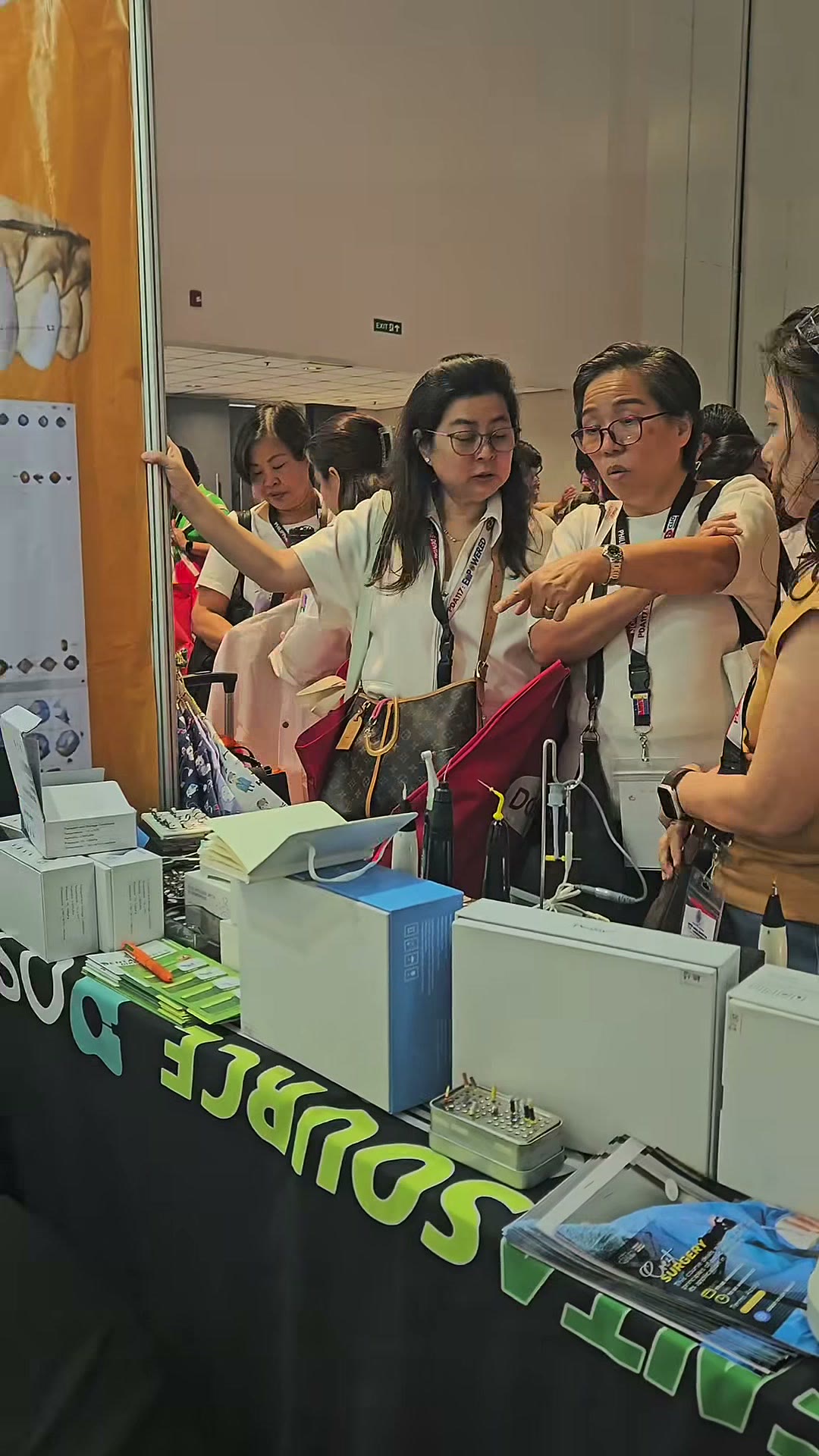 Visitors trying the equipment at the demo table