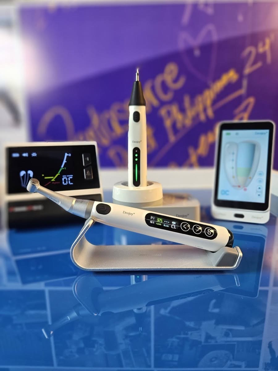 The endodontic motor on its stand with the apex locators behind it