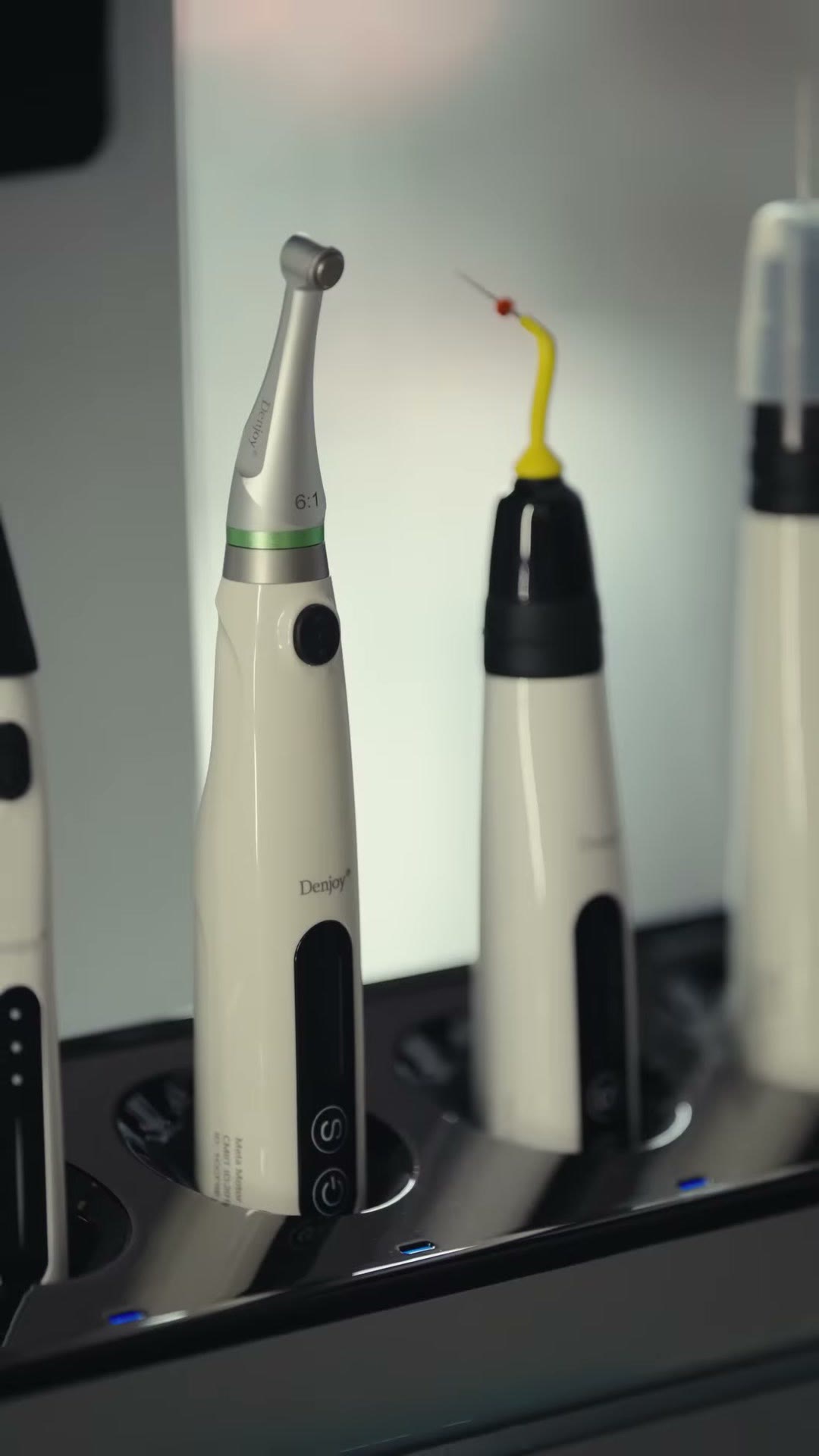 Close-up of the endodontic motors seated in the dock
