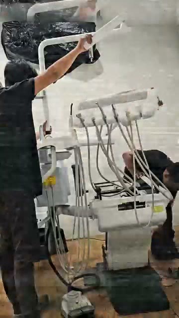 The old dental unit in the operatory before work begins