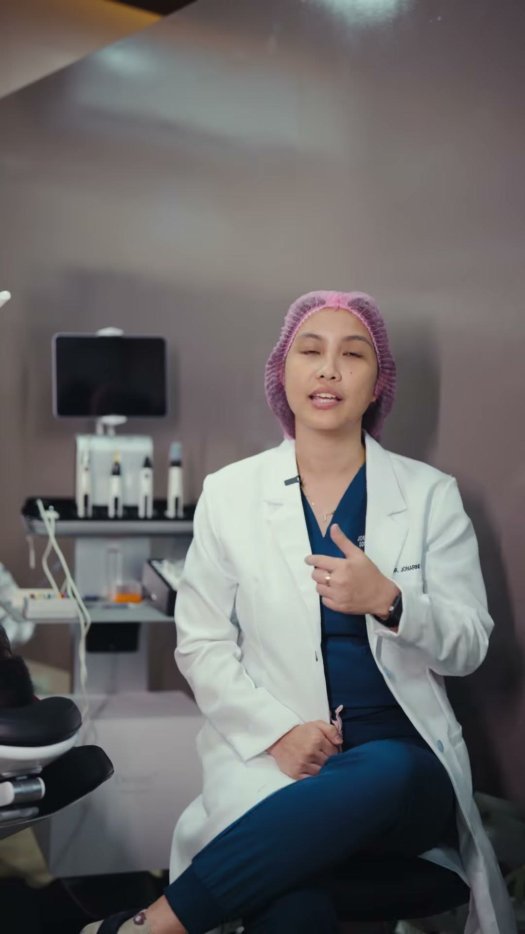 The dentist seated for the interview in her own clinic