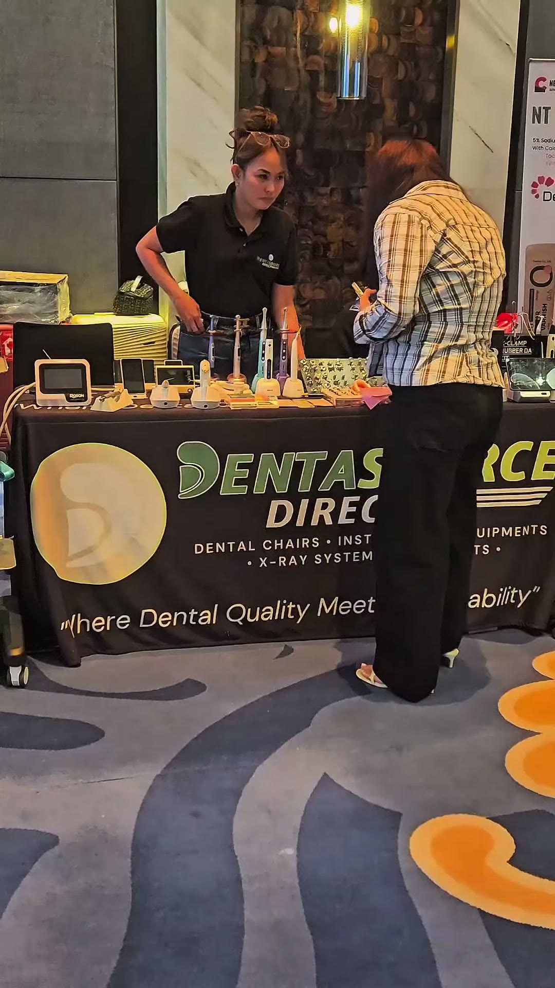 The DentaSource table with a visitor at the close of DIGICON 2026