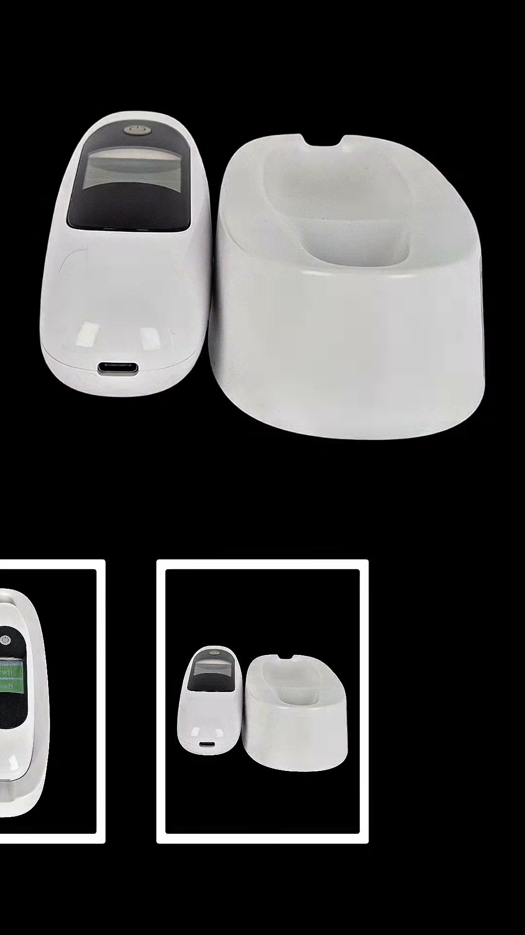The KOUNGSUN handheld shade matching device beside its charging cradle
