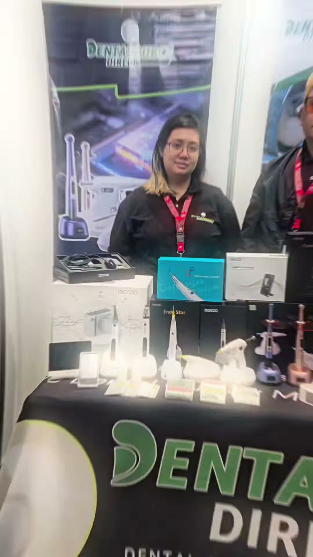 Our staff behind the counter with handpieces and endodontic boxes