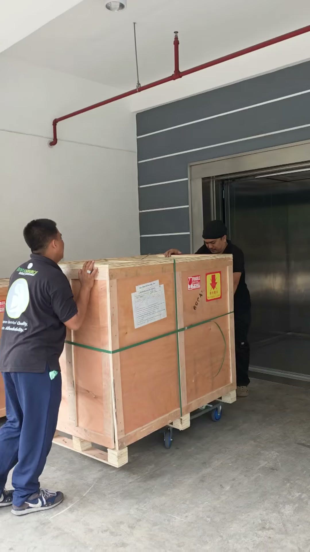 A crate on a dolly at the loading dock on unloading day