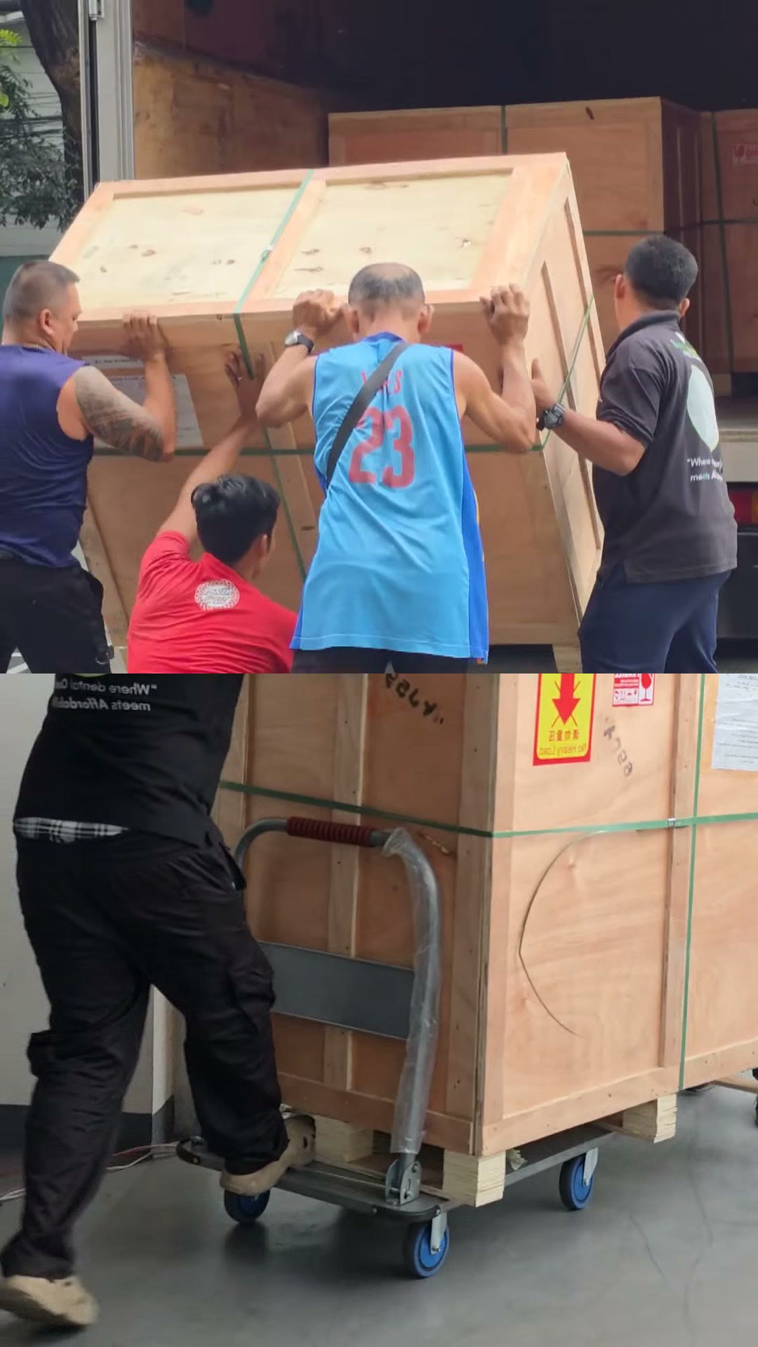 Three of our team lifting a packed crate off the delivery truck
