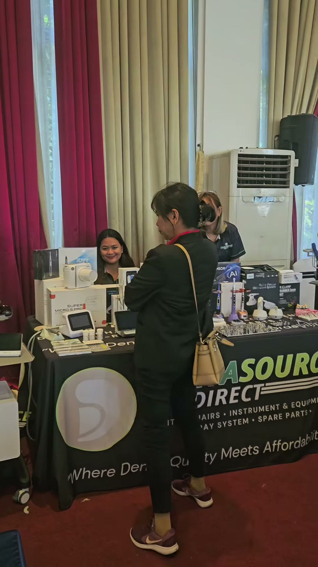 A dentist looking over the equipment at our table