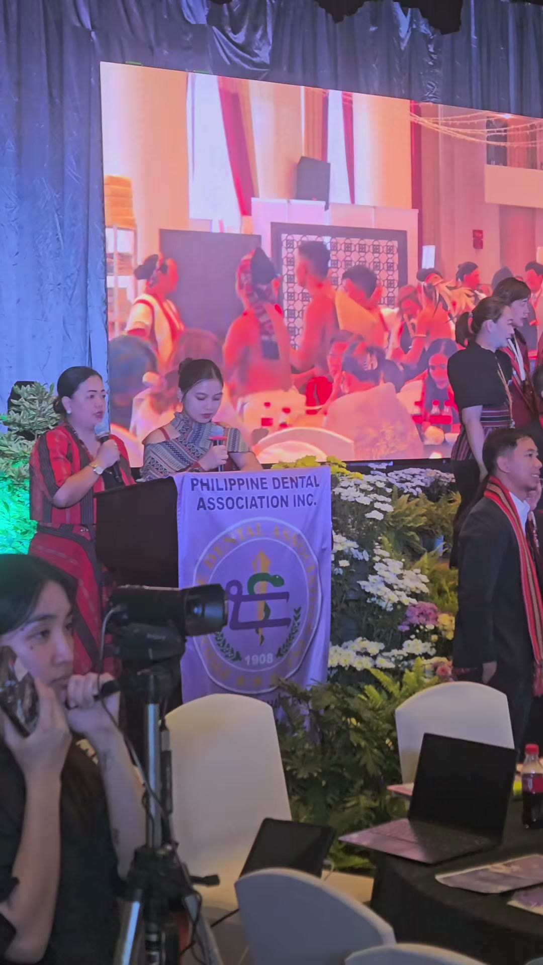 The Philippine Dental Association backdrop and the seated audience