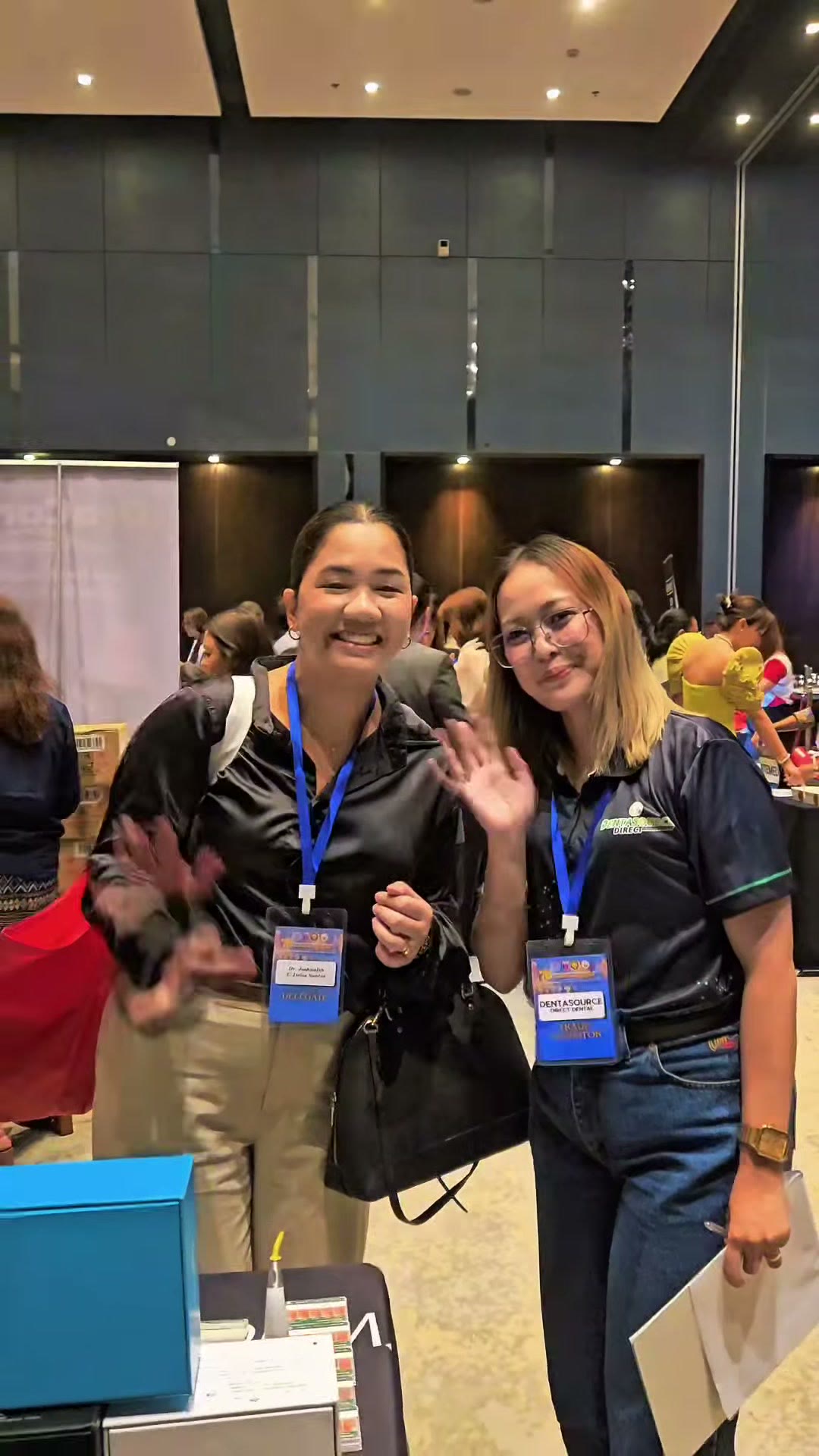 Two of our team at the DentaSource Direct table in the ballroom