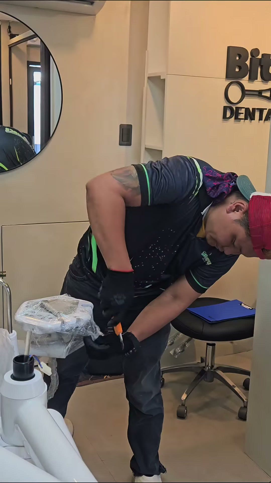 Our technician setting the unit in the operatory