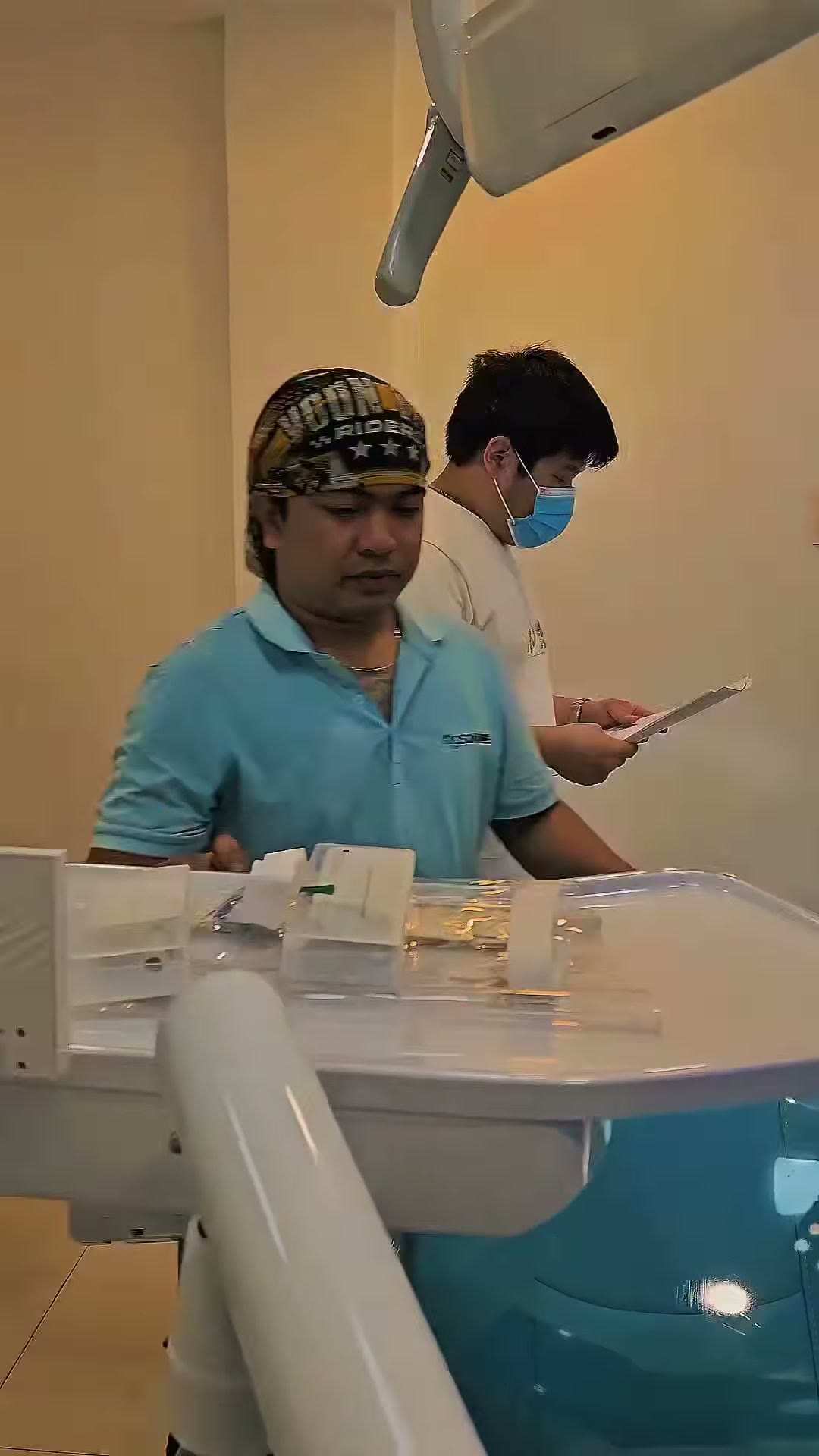 Handing the unit documents to the dentist at the end of the install