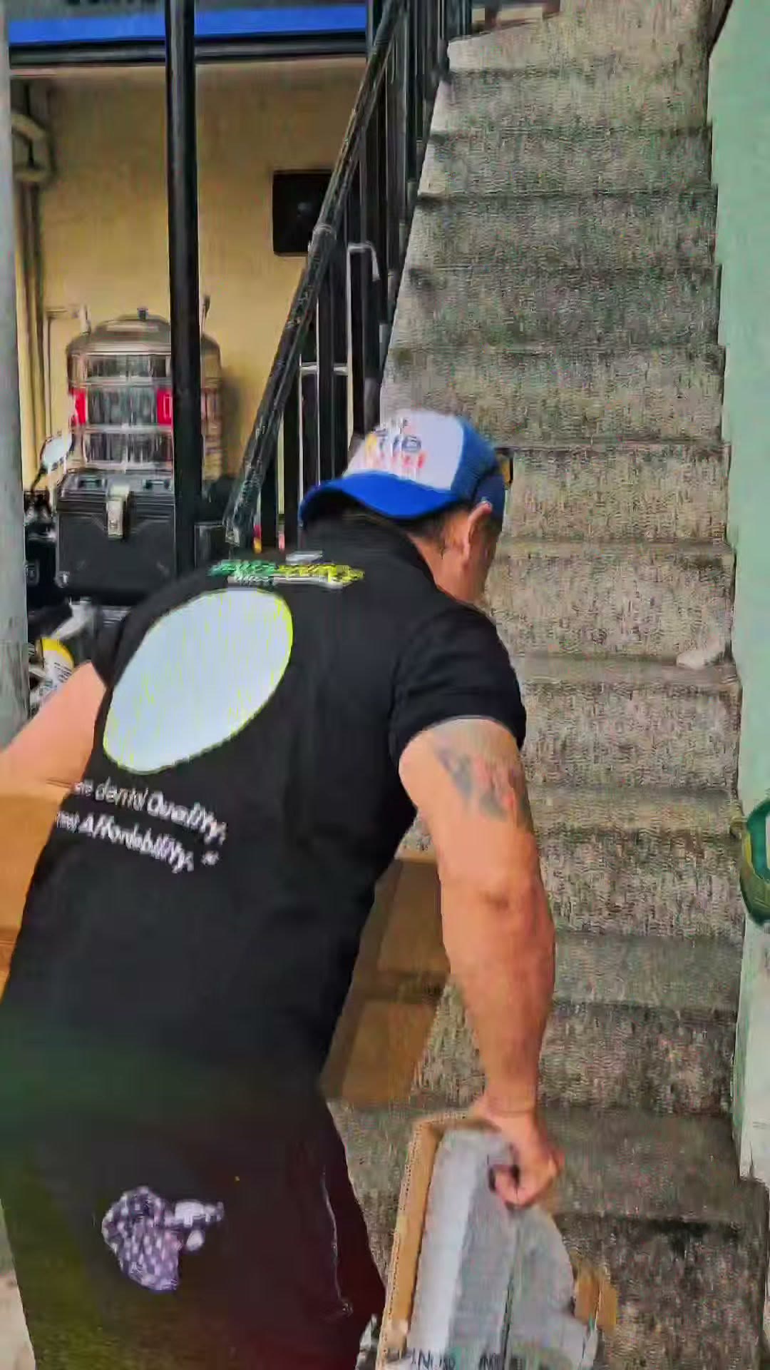 Climbing the outdoor concrete stair with a chair component