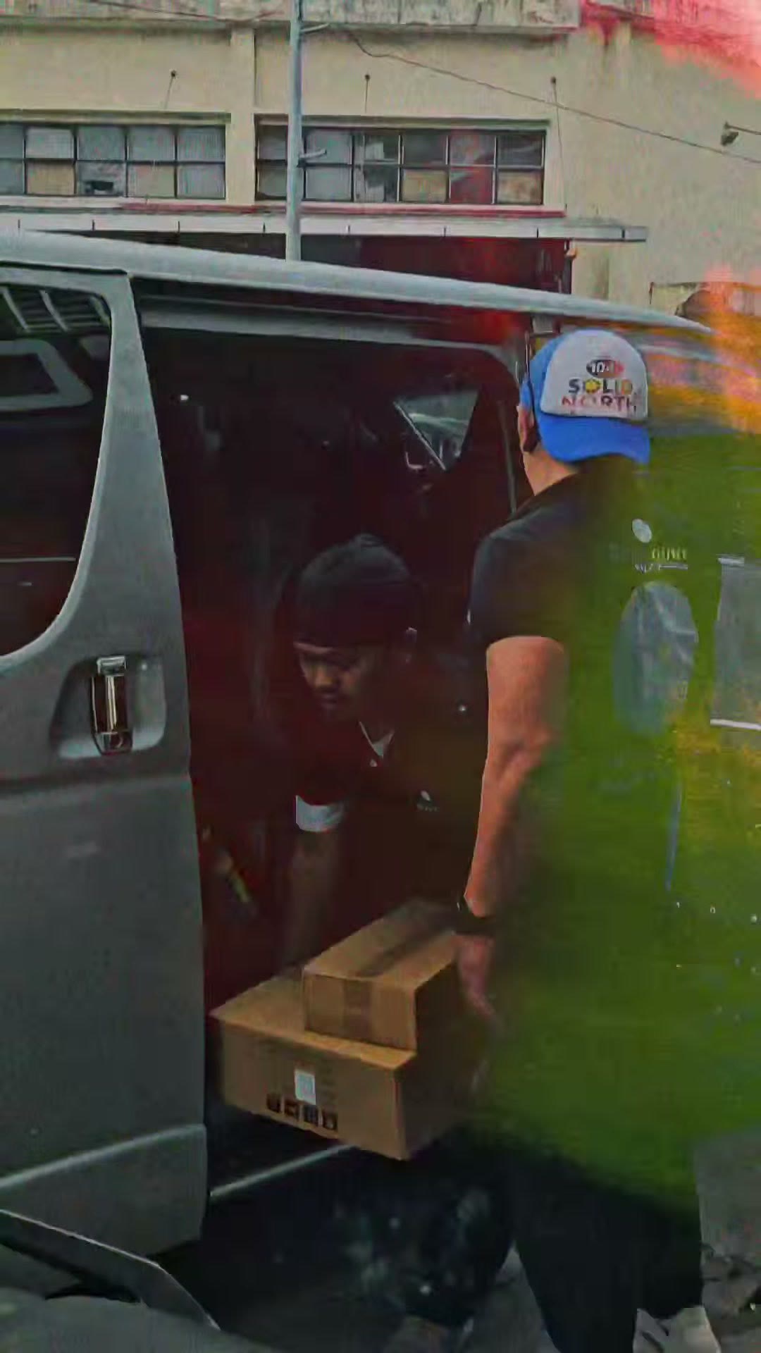 Unloading equipment boxes from the delivery van