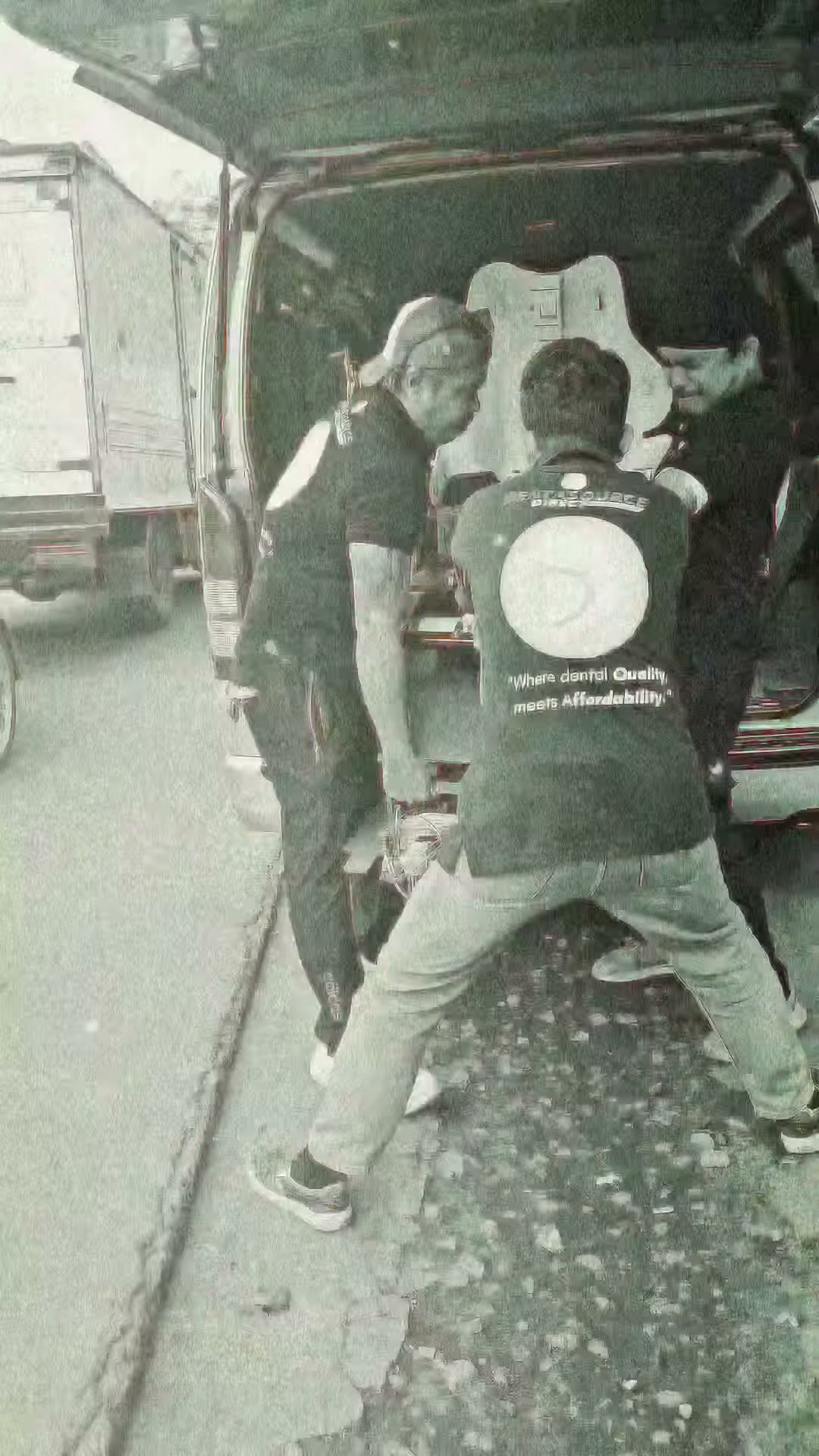 Carrying a unit off the truck at the delivery address