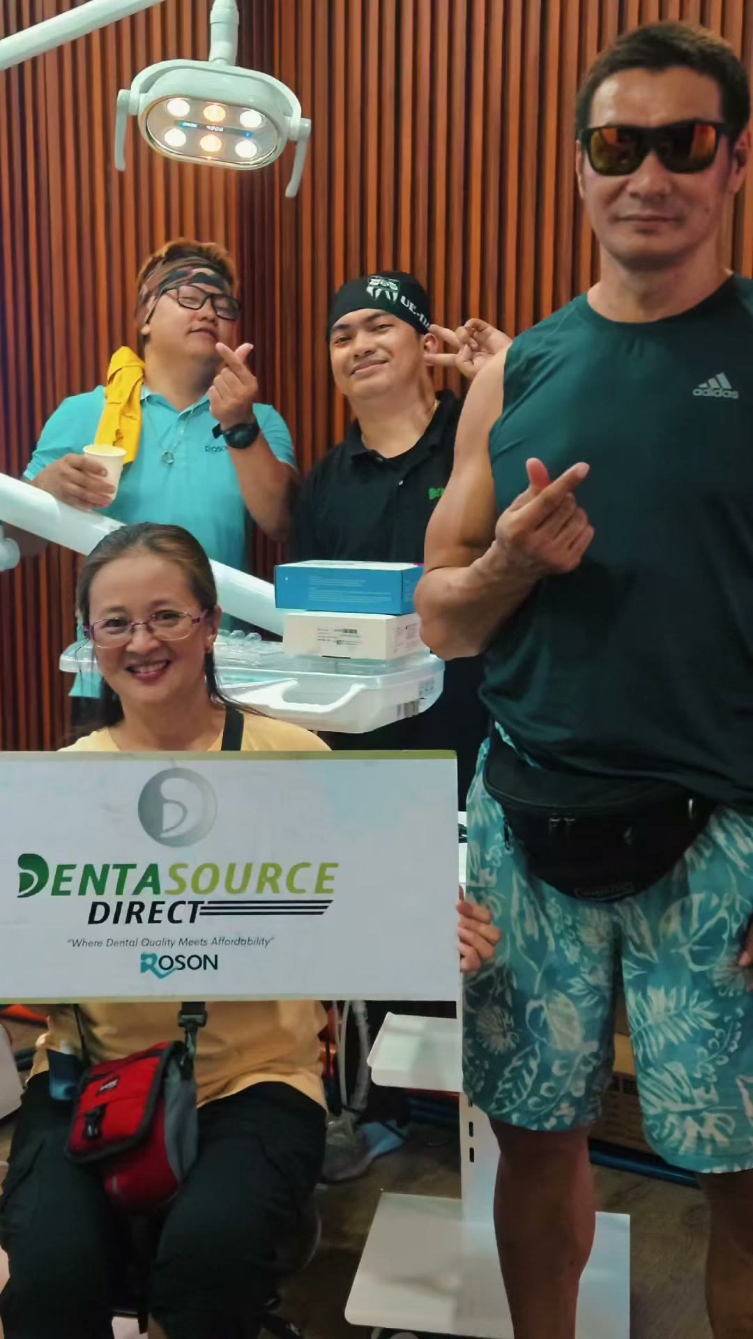 The team and the dentist with the DentaSource and ROSON board