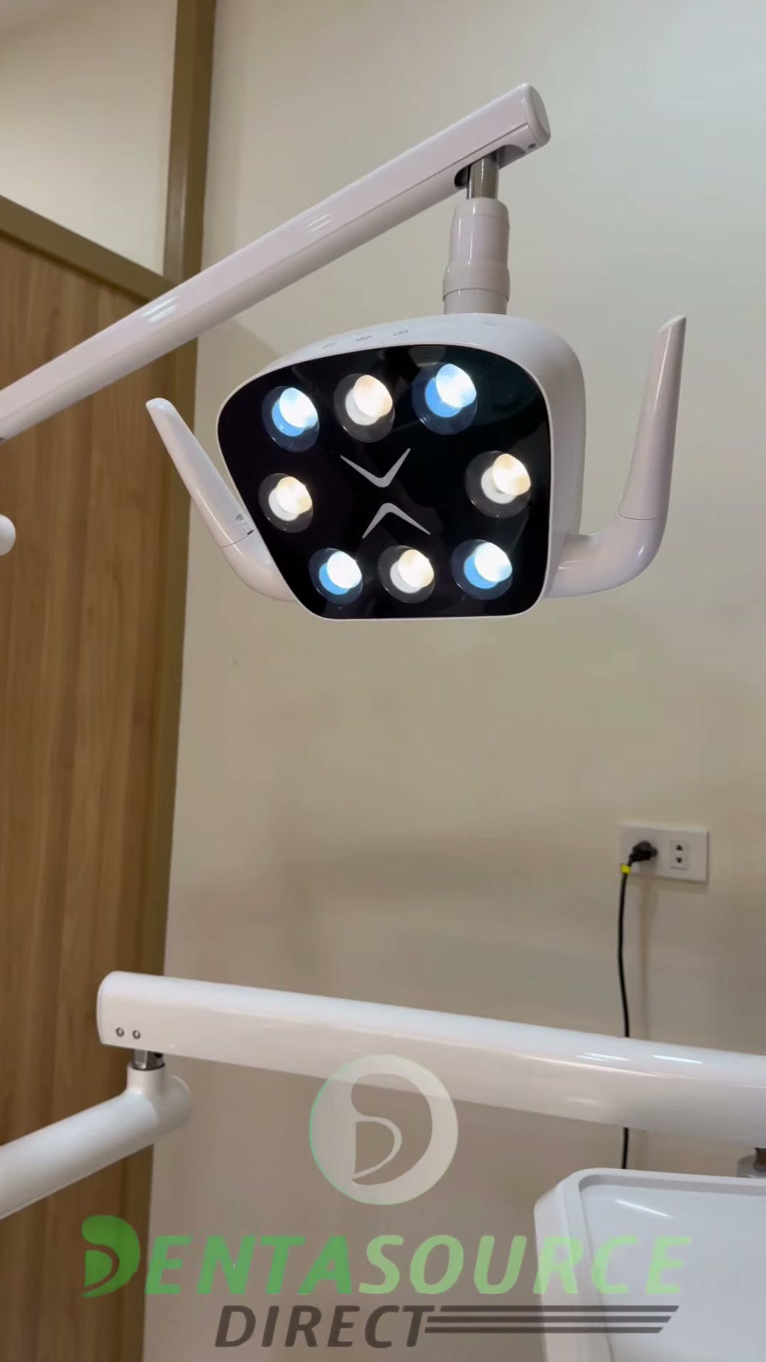 The finished light on its arm in the treatment room