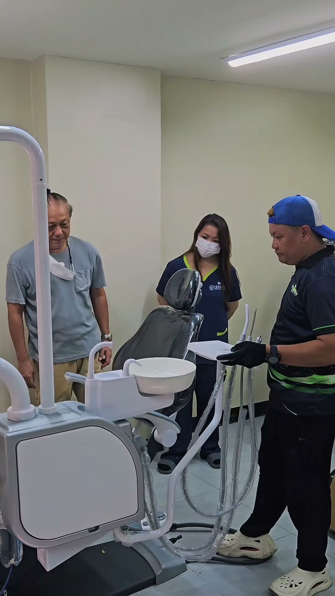Our team with the clinic staff beside the two new DX-S3 chairs