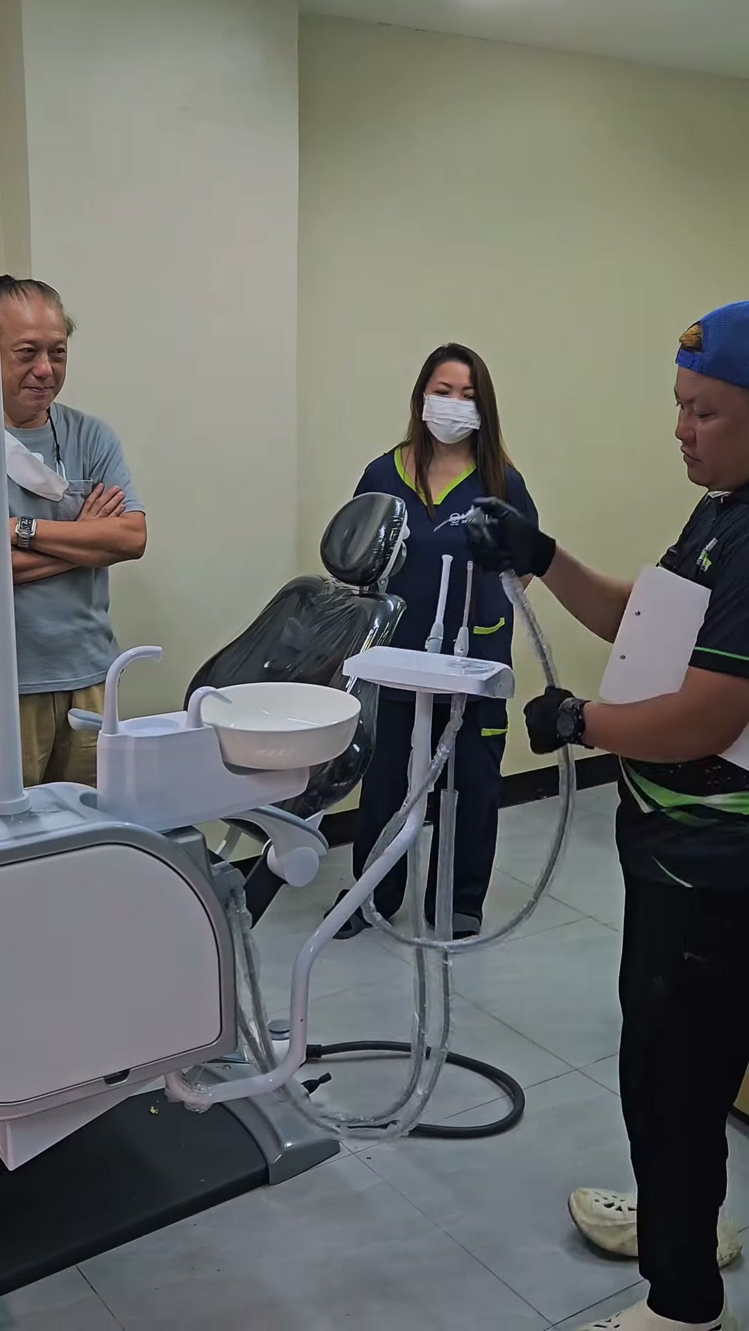 Our technician with the dentist at the newly installed unit